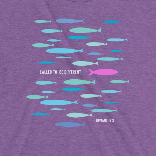 Purple t-shirt with colorful fish pattern and text on a plain background