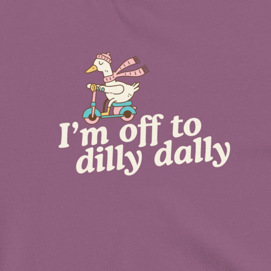 Purple shirt with a cartoon goose on a scooter and text 'I'm off to dilly dally' on a purple background
