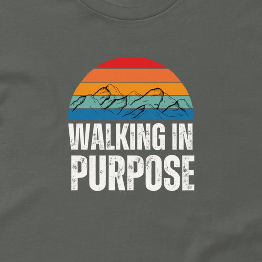Gray t-shirt with 'Walking in Purpose' graphic design featuring a colorful sunset and mountains.