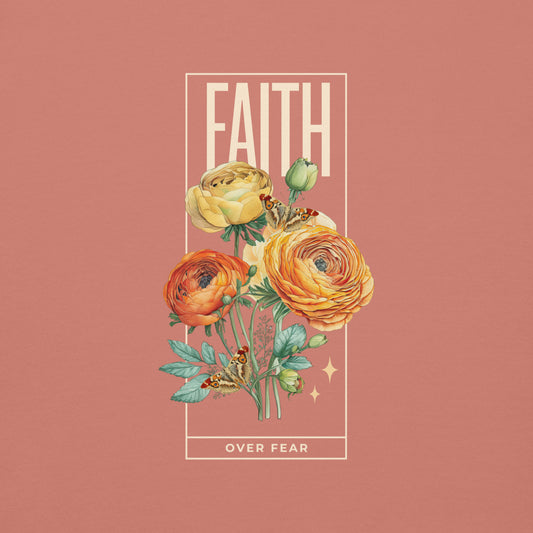 Faith over Fear floral graphic on dusty rose colored hoodie, laid flat. Bold 'Faith' above flowers, small 'Fear' below.