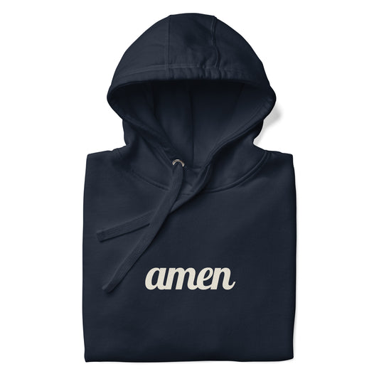The word 'amen' in white text on a navy colored hoodie.