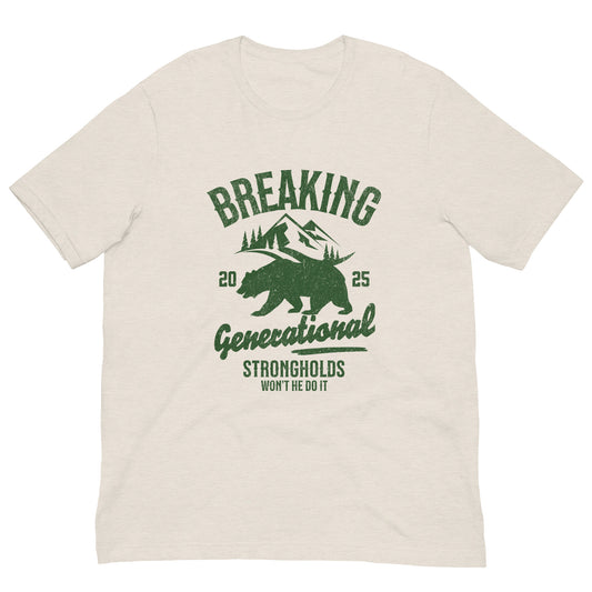 Heather dust colored t-shirt with green graphic design featuring a bear, mountains, and text that says Breaking Generational Strongholds.