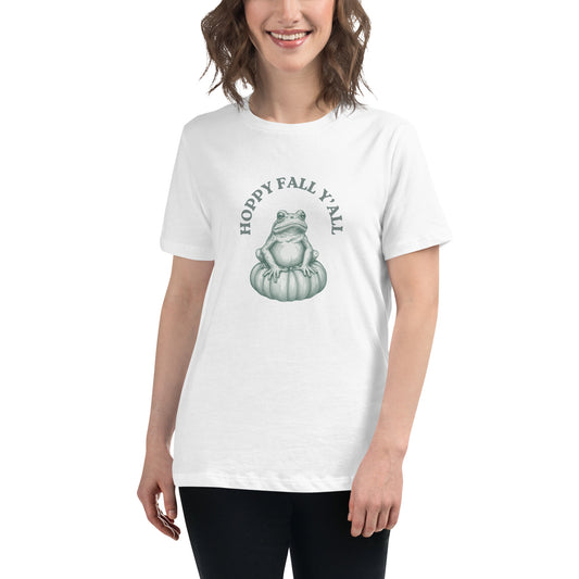 Woman wearing white T-shirt with a frog on a pumpkin and 'Hoppy Fall Y'all' text