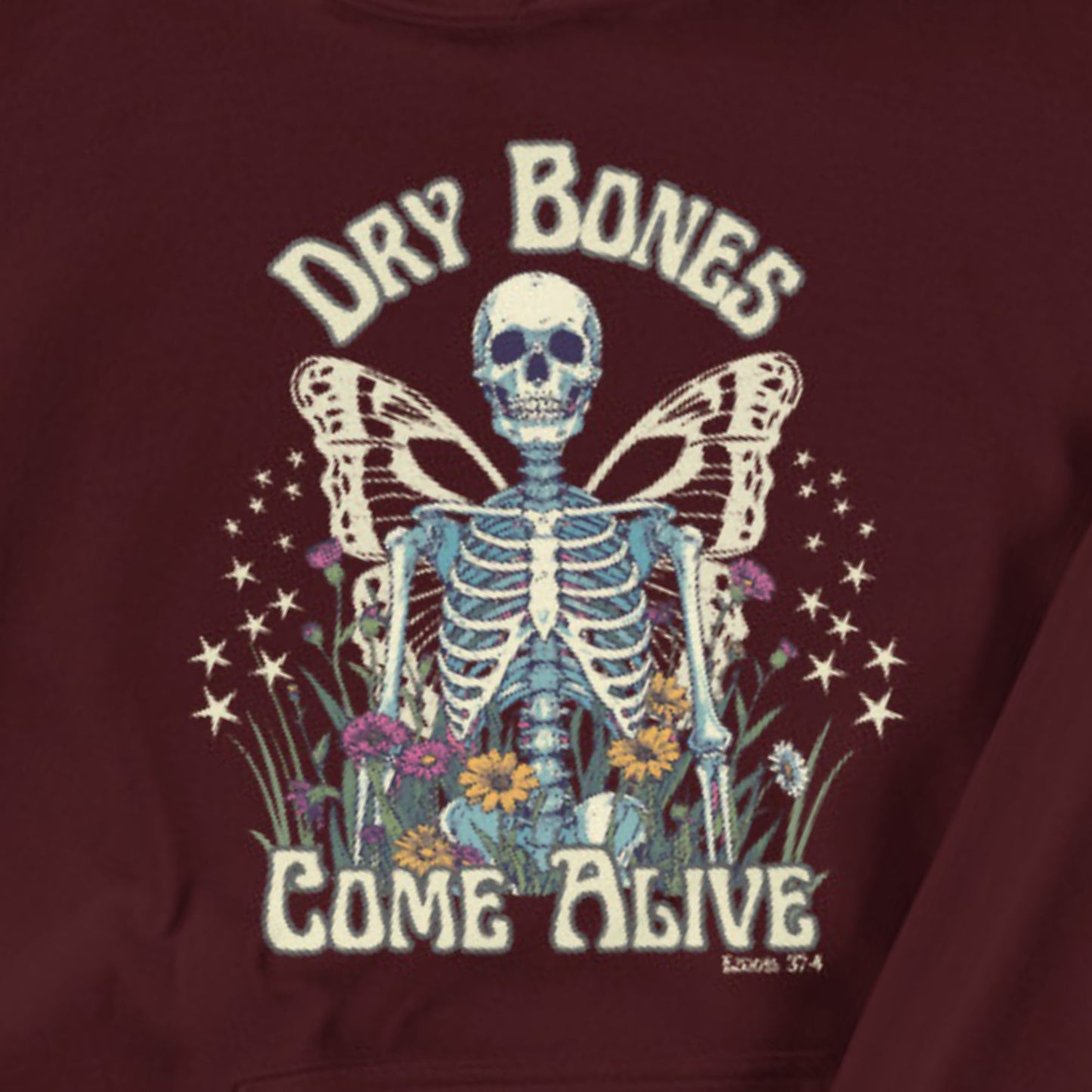 Maroon sweatshirt with a skeleton and butterfly design and text 'Dry Bones Come Alive' on a maroon background.