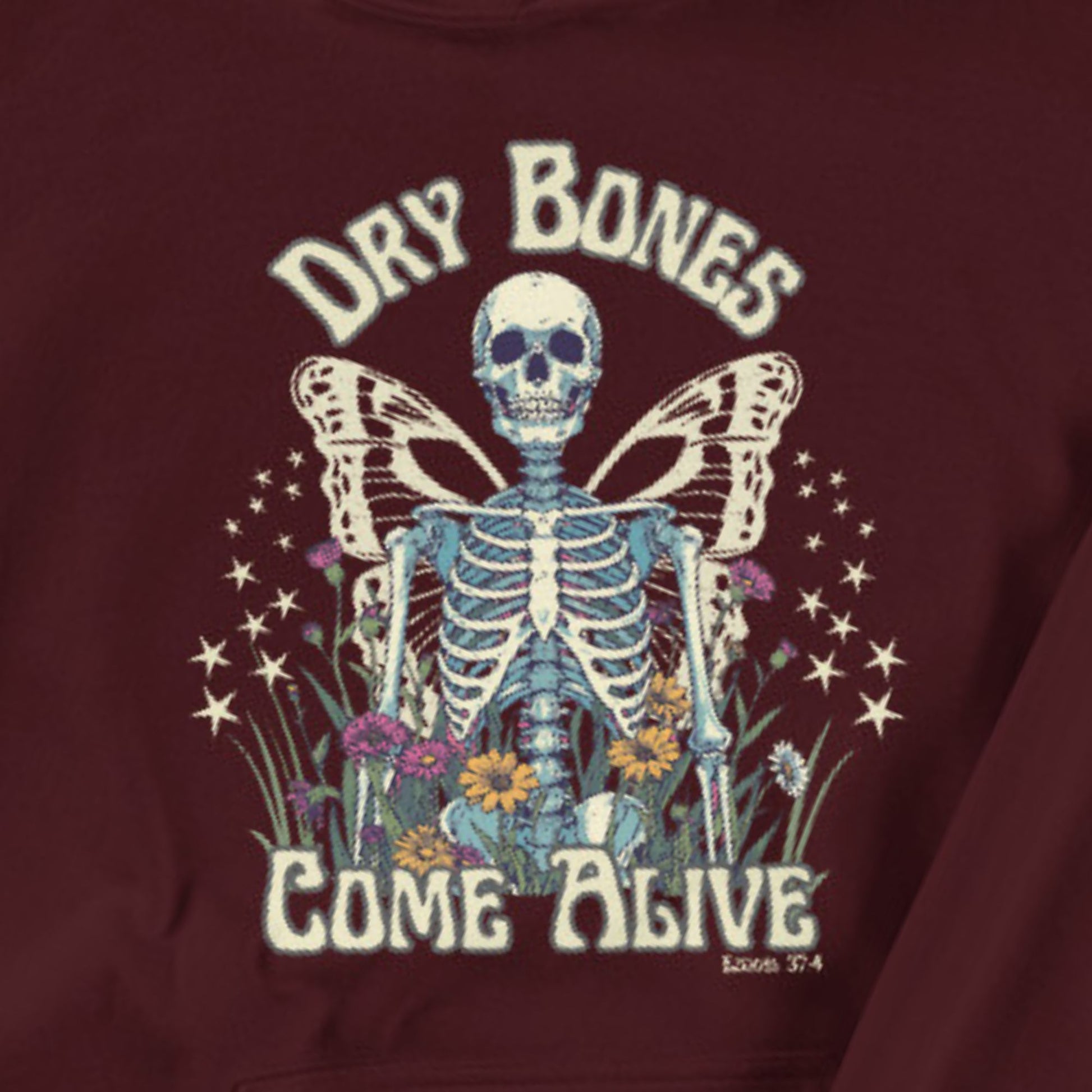 Maroon sweatshirt with a skeleton and butterfly design and text 'Dry Bones Come Alive' on a maroon background.