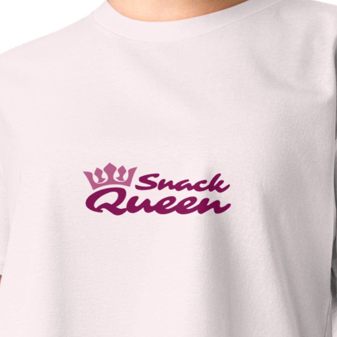 White t-shirt with 'Snack Queen' text in purple on a white background