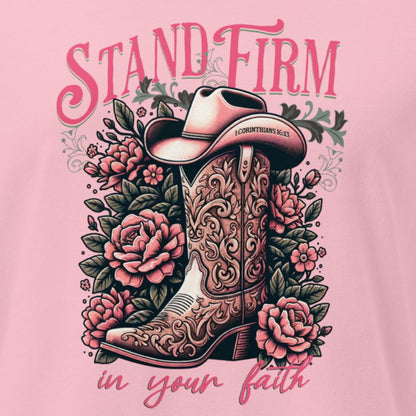 Decorative graphic with cowboy boot, flowers, and 'Stand Firm in Your Faith' text on a pink background. 1 Corinthians 16:13 inscribed on bill of hat.