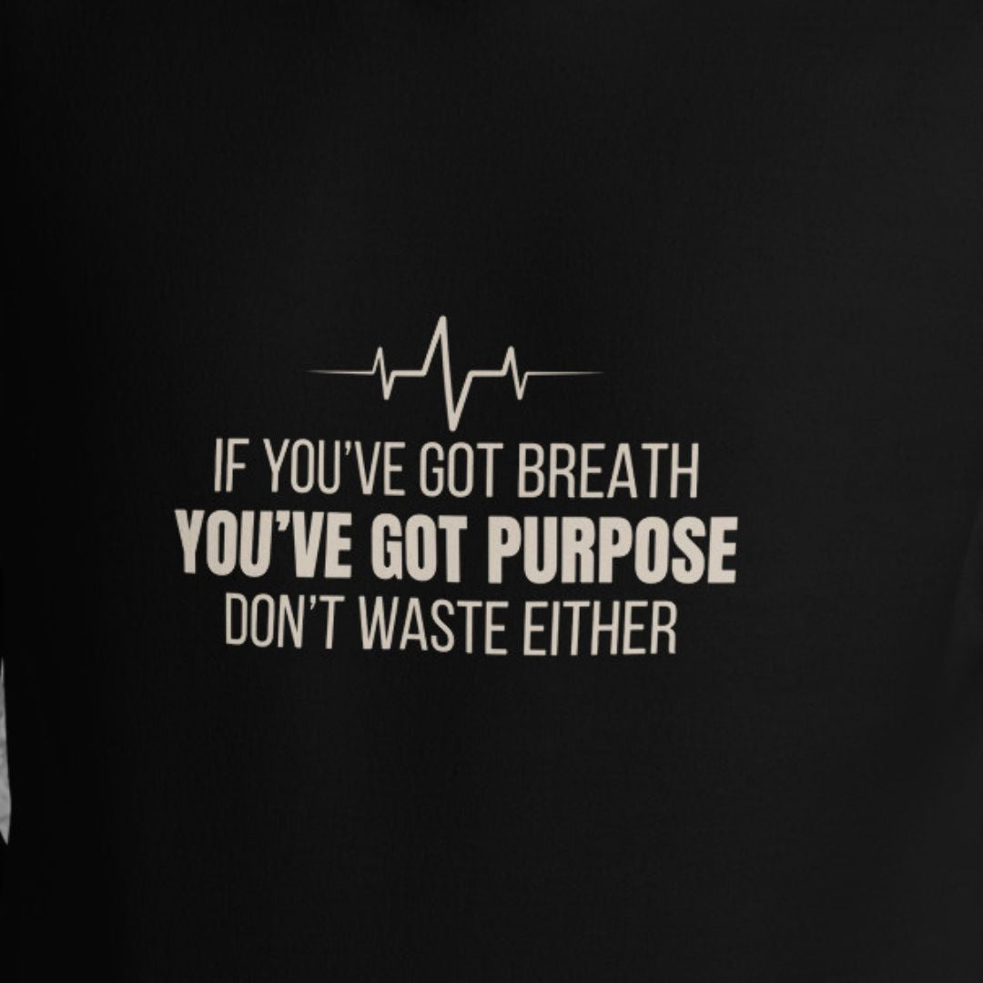 If you've got breath, you've got purpose text on a black hoodie.
