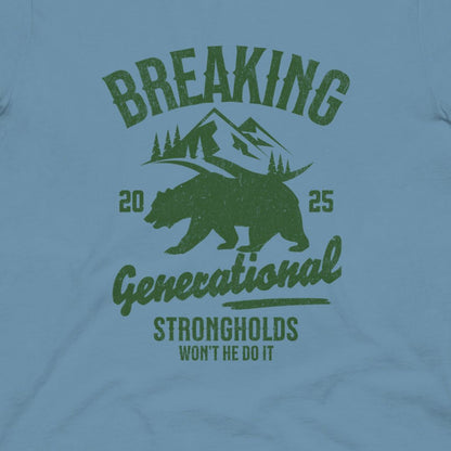 Light blue t-shirt with green graphic design featuring a bear, mountains, and text on a light blue background.