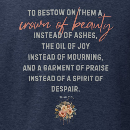 Navy blue shirt with inspirational quote found in Isahiah 61:3 and floral design on a dark background. This is the back of the shirt.