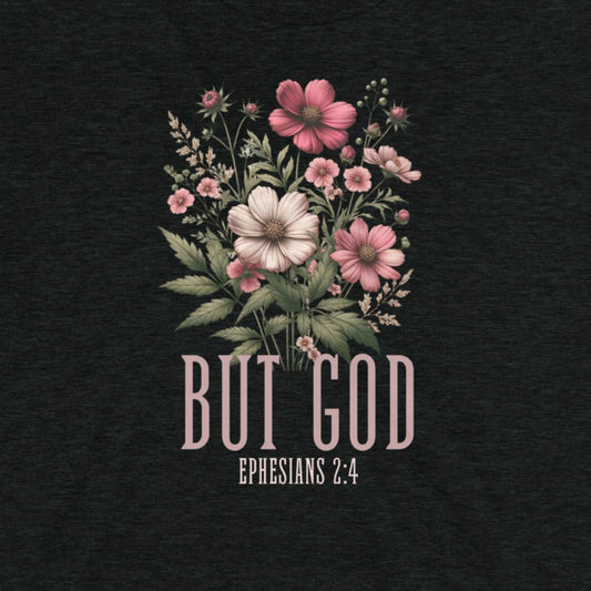 Floral design with 'But God Ephesians 2:4' text on a dark background