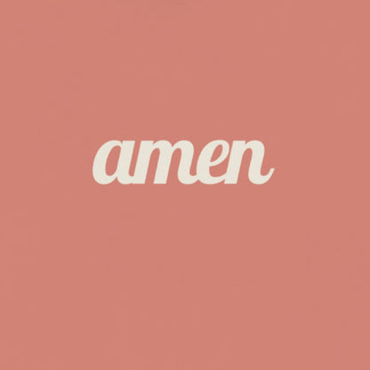 The word 'amen' in white text on a dust rose colored hoodie, up close view