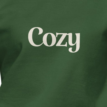 Green sweatshirt with 'Cozy' printed in white
