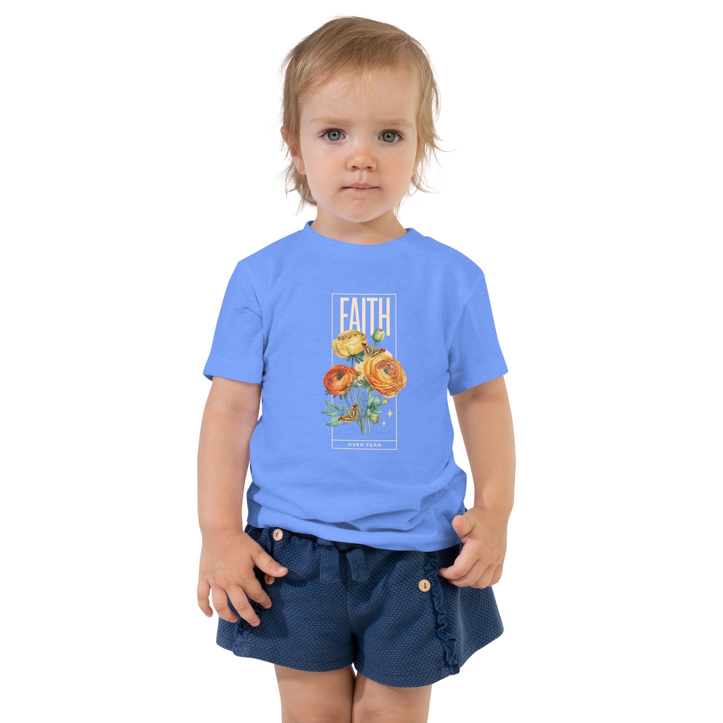 Toddler wearing light blue Faith Over Fear tee with colorful roses and butterflies.