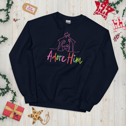 Navy colored Christian Christmas sweatshirt featuring colorful silhouette of a nativity scene with Adore Him text. 