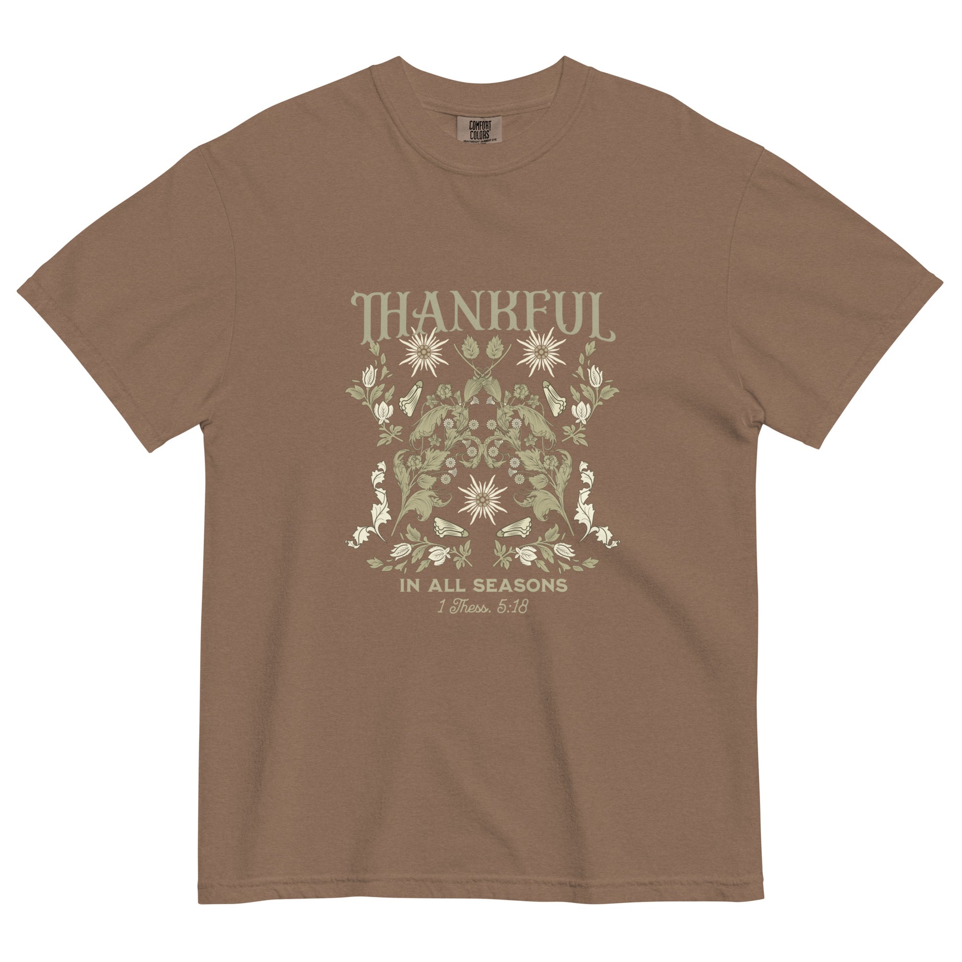 Thankful in All Seasons tee with 1 Thessalonians 5:18 verse. Faith-inspired design on seasonal-themed shirt.