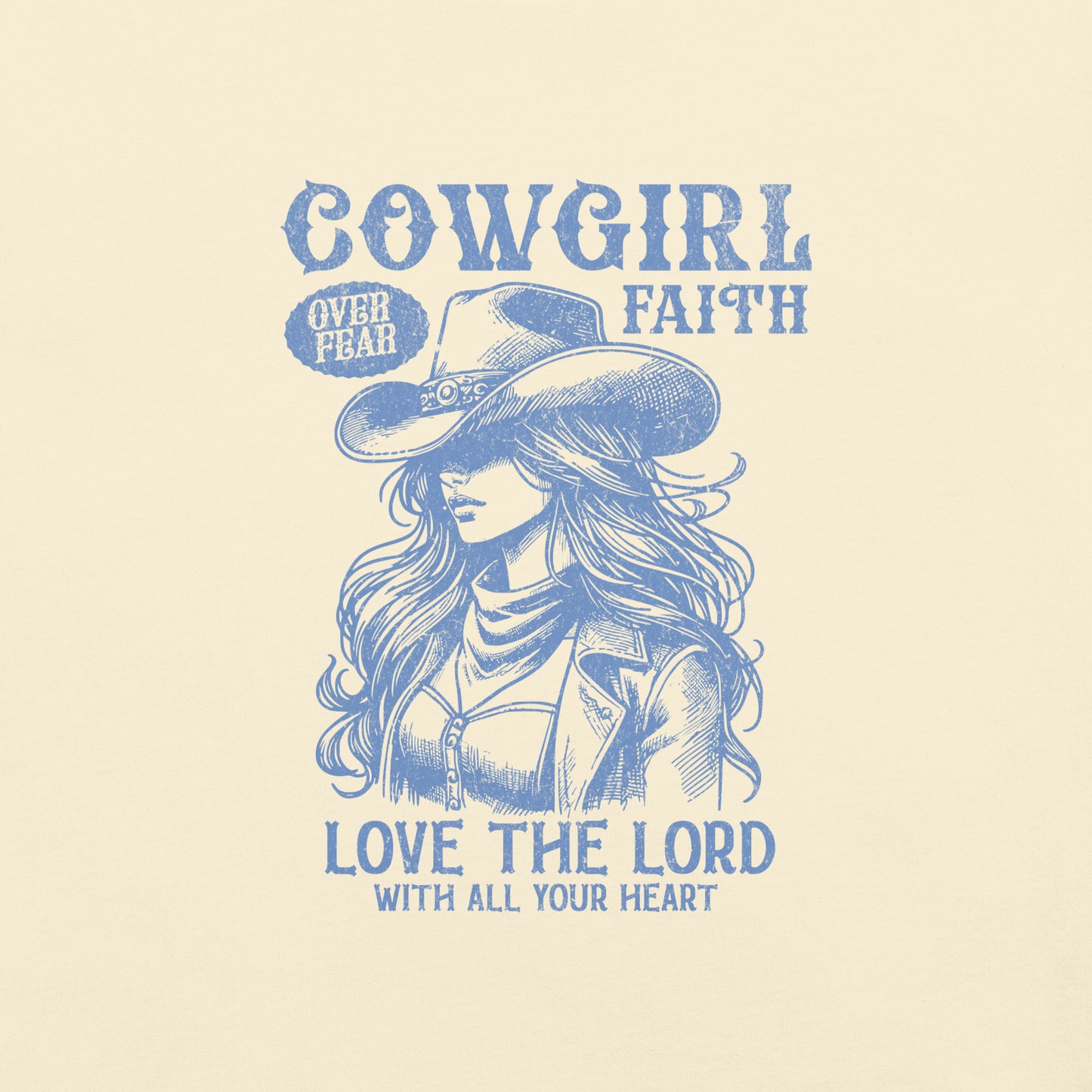Ivory colored Cowgirl Faith t-shirt featuring a graphic image of a cowgirl wearing a hat and subtext of Love the Lord with all your heart.