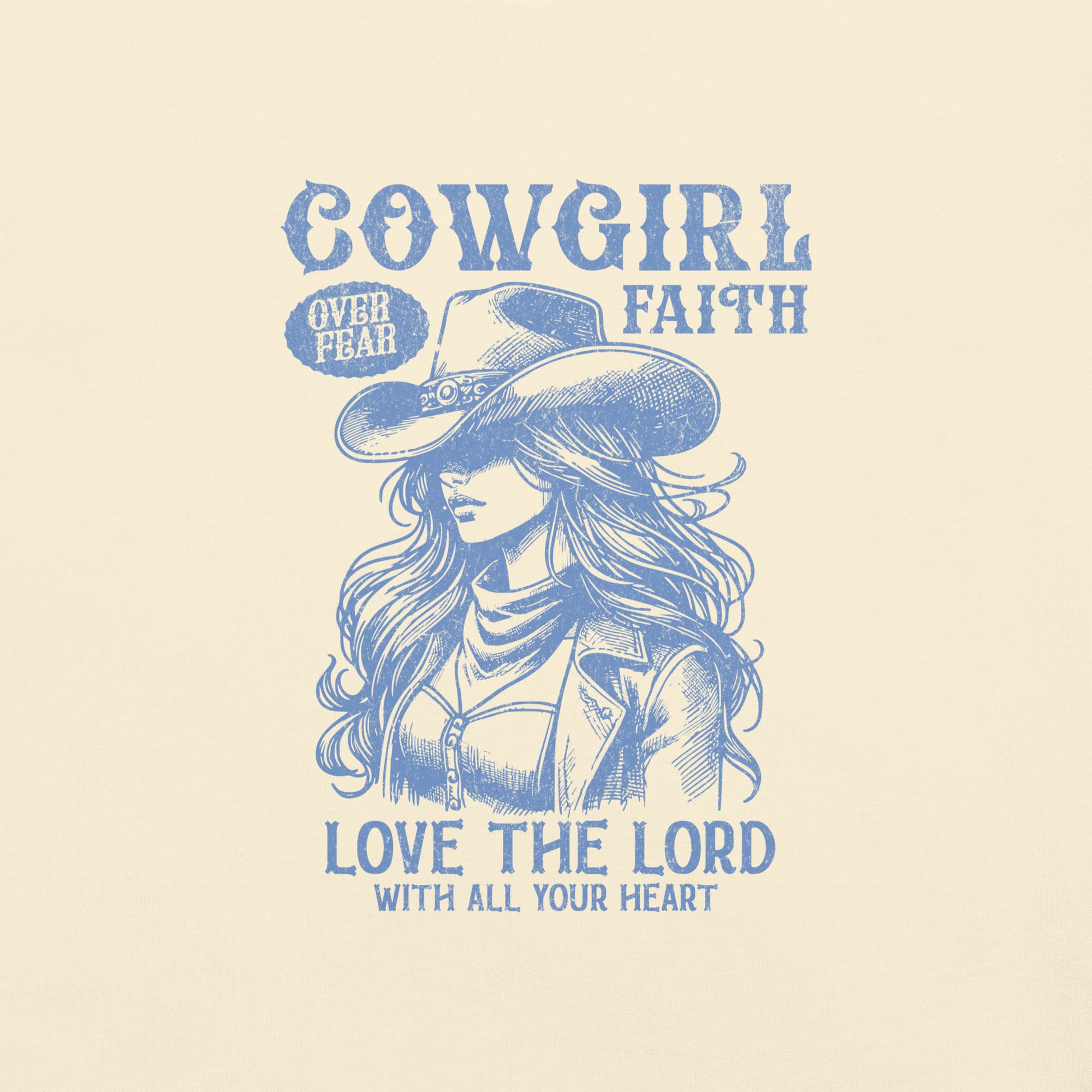 Ivory colored Cowgirl Faith t-shirt featuring a graphic image of a cowgirl wearing a hat and subtext of Love the Lord with all your heart.