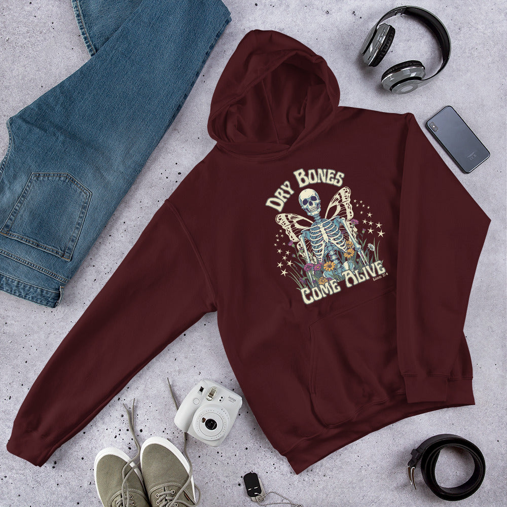 Dry bones come alive hoodie mockup with other clothing articles around. Skeleton image and christian message.