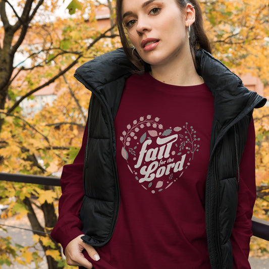 Maroon long sleeve t-shirt on a woman featuring a heart-shaped floral design, symbolizing devotion and autumnal beauty."
