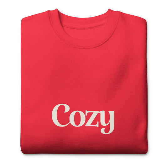 Red sweatshirt with 'Cozy' printed in white