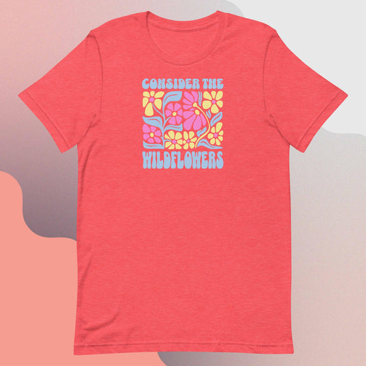 Heather red T-shirt with floral design and text 'Consider the Wildflowers' 
