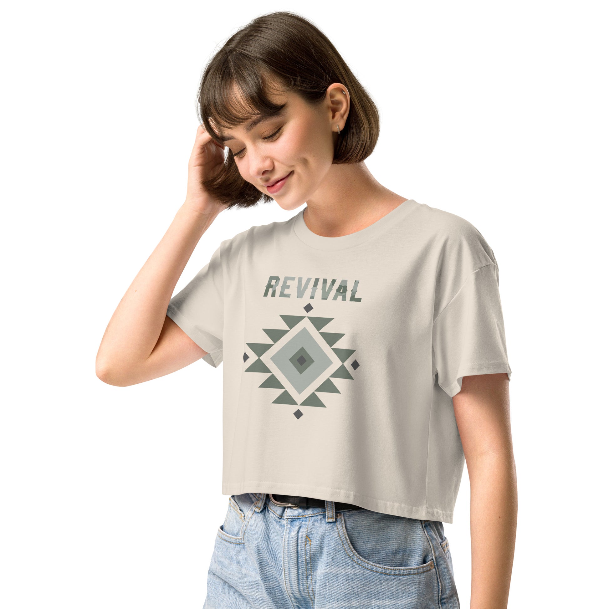 Model wearing Revival t-shirt with Aztec style pattern. Minimalist design, big message