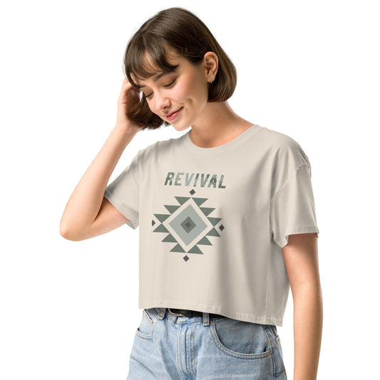 Model wearing Revival t-shirt with Aztec style pattern. Minimalist design, big message