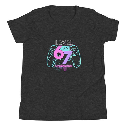 Level 67 Unlocked text over a video game controller image. Dark grey heather kids t-shirt.