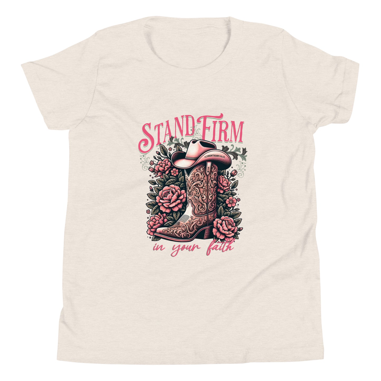 Decorative graphic with cowboy boot, flowers, and 'Stand Firm in Your Faith' text on a heather dust colored shirt. 1 Corinthians 16:13 inscribed on bill of hat.